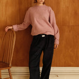 female model wearing navy speltham corduroy lounge trousers