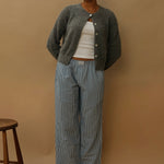 female model wearing blue striped speltham lounge pants