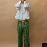 male model wearing speltham green inverted stripe lounge pants