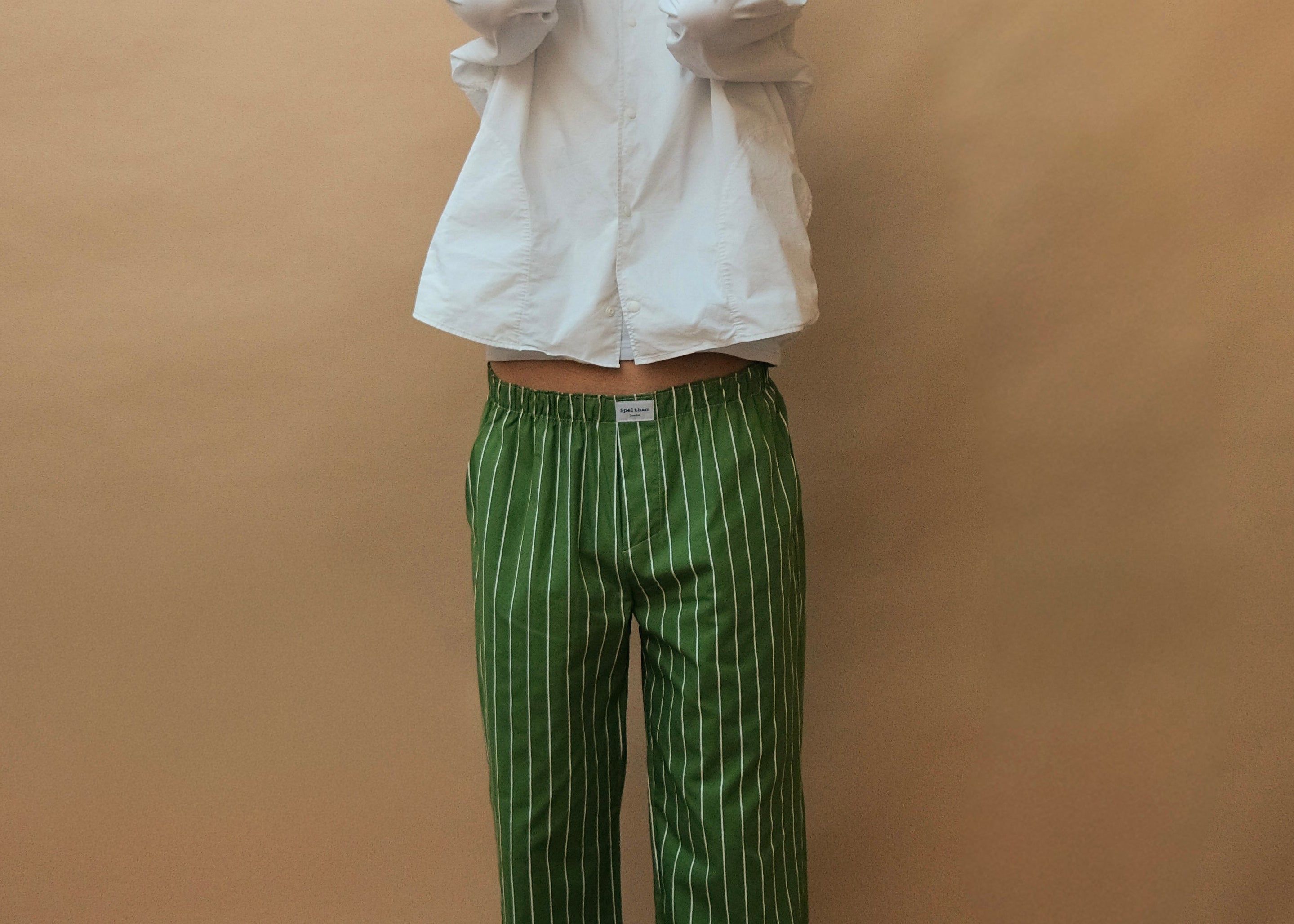 male model wearing speltham green inverted stripe lounge pants