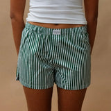 female model wearing green striped speltham unisex boxer shorts