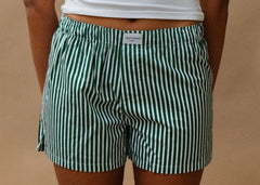 female model wearing green striped speltham unisex boxer shorts