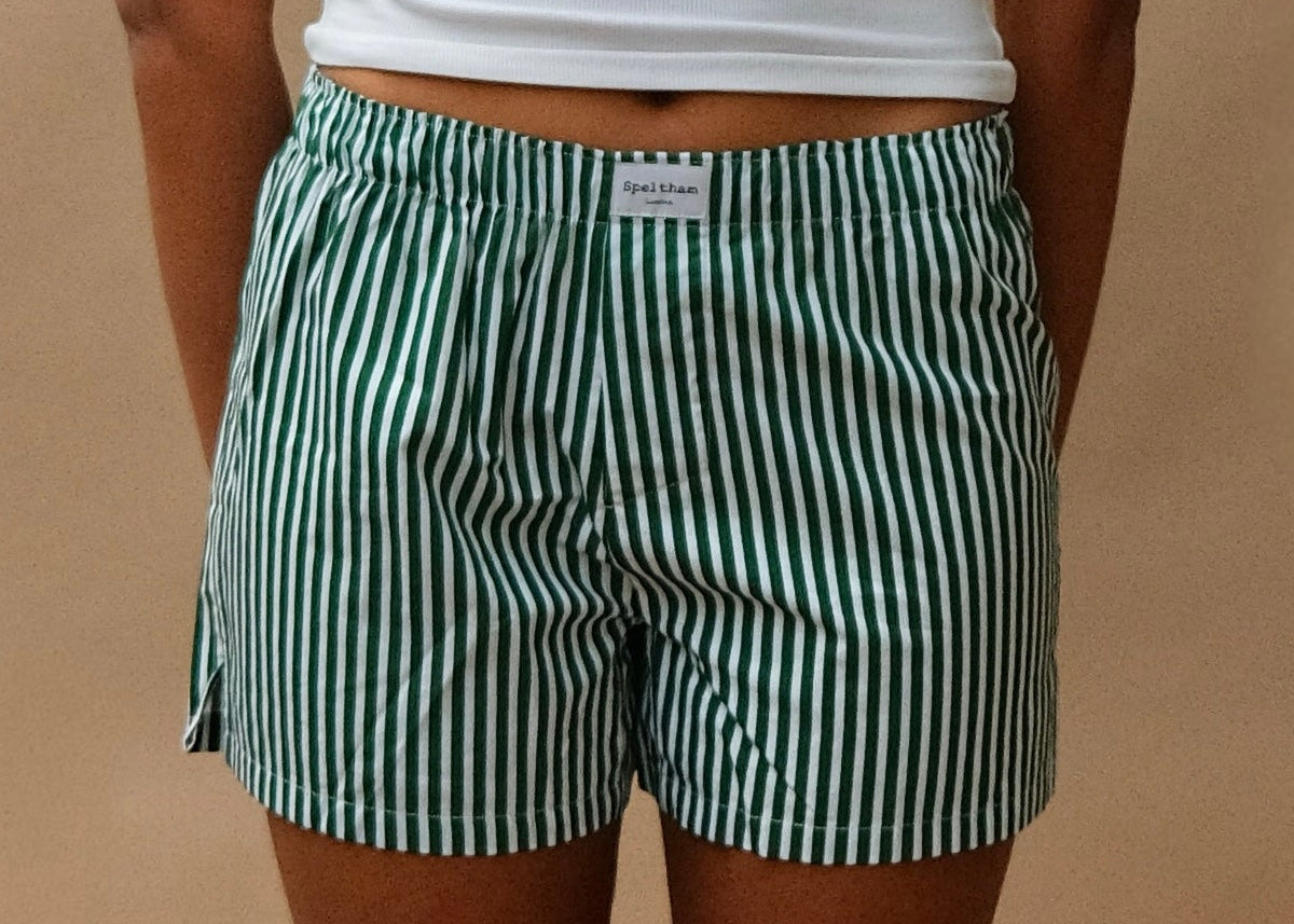 female model wearing green striped speltham unisex boxer shorts