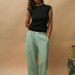 female model wearing jade seersucker speltham lounge pants
