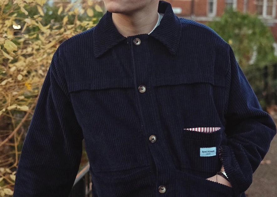 male model wearing speltham navy corduroy jacket