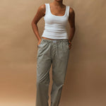 female model wearing navy speltham lounge pants