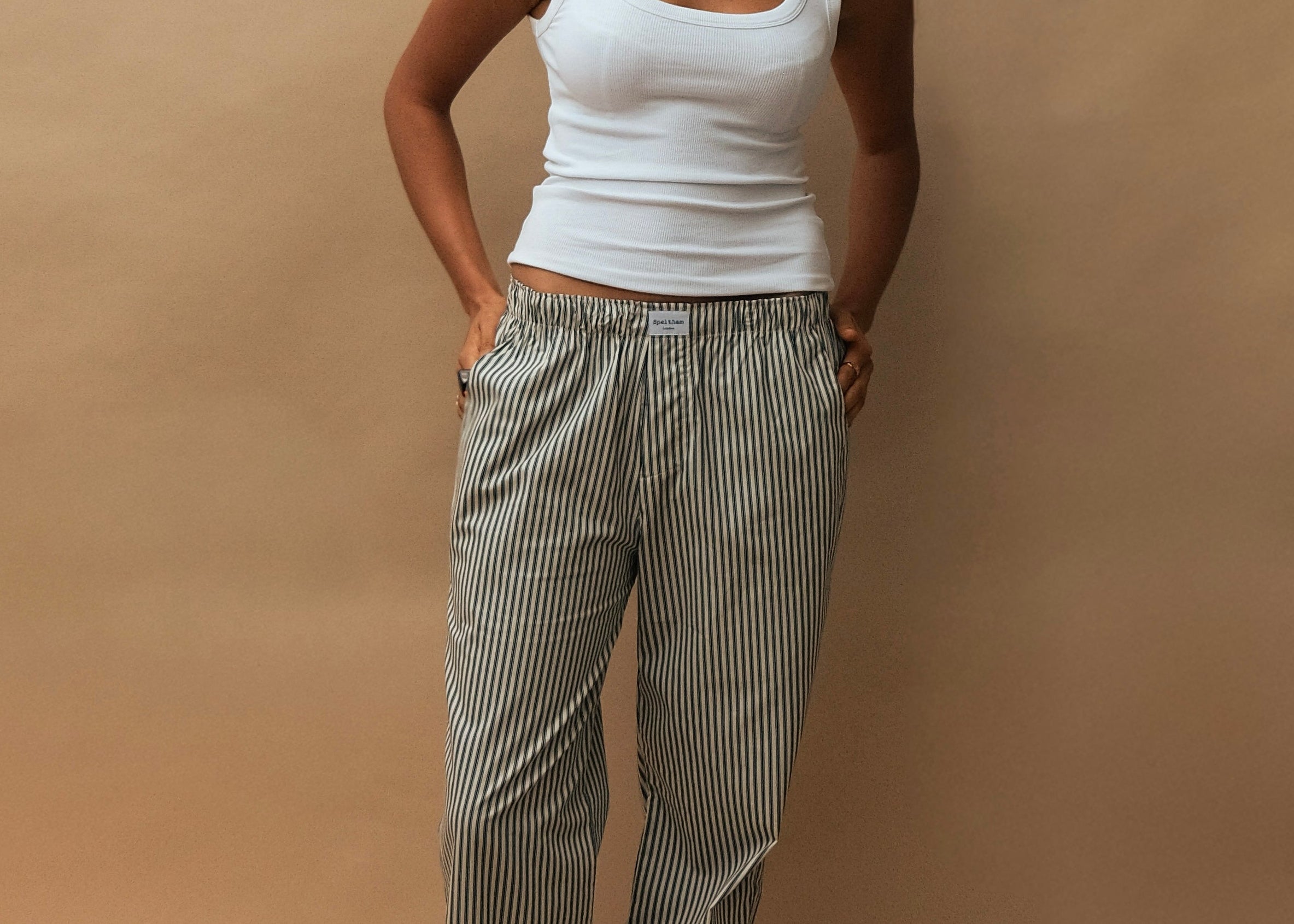 female model wearing navy speltham lounge pants