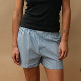 female model wearing speltham navy unisex seersucker boxer shorts
