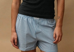 female model wearing speltham navy unisex seersucker boxer shorts