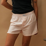 female model wearing pink striped speltham boxer shorts