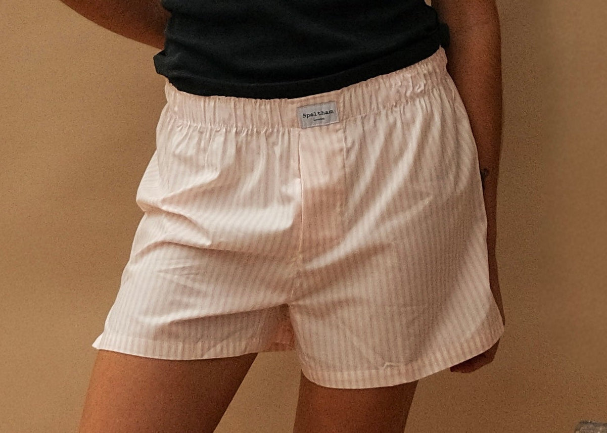 female model wearing pink striped speltham boxer shorts